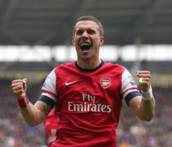 Podolski shines, Arsenal blank sorry Hull